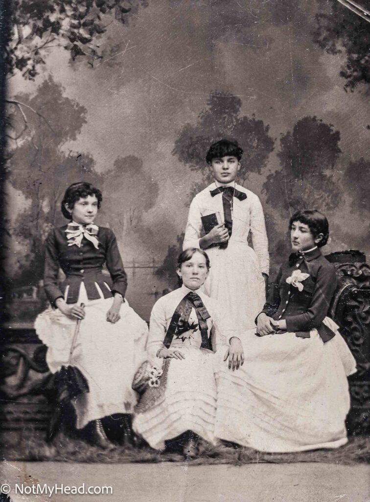 Photo of: Cousins: Clara Mitchell, Maude Elizabeth Mitchell, Unknown, Elizabeth Cameron  Date: 1885 Location:  Plainfield Wisconsin USA