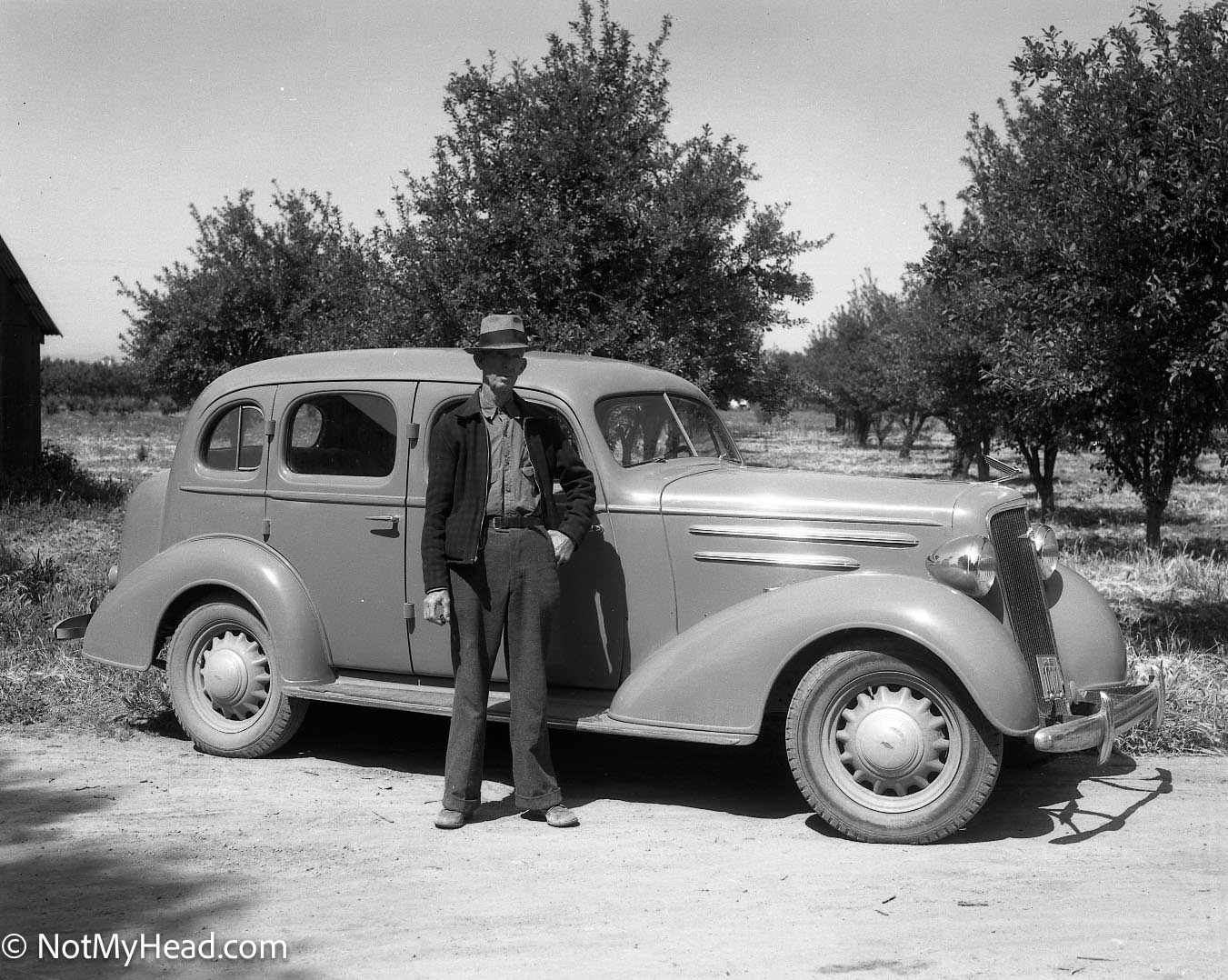 Photo of: Home folks & Morris family Hollister May 8, 1938 Date: 1938-05-08Location: Santa Ana Road Hollister California USA