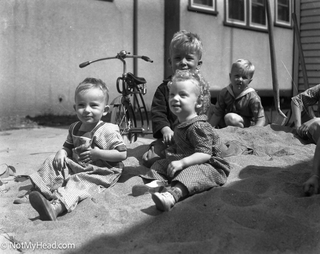 Photo of: In the Sandpile Sept 25, 1938 Nancy, Geedy & Gary  Date:  Location:    USA