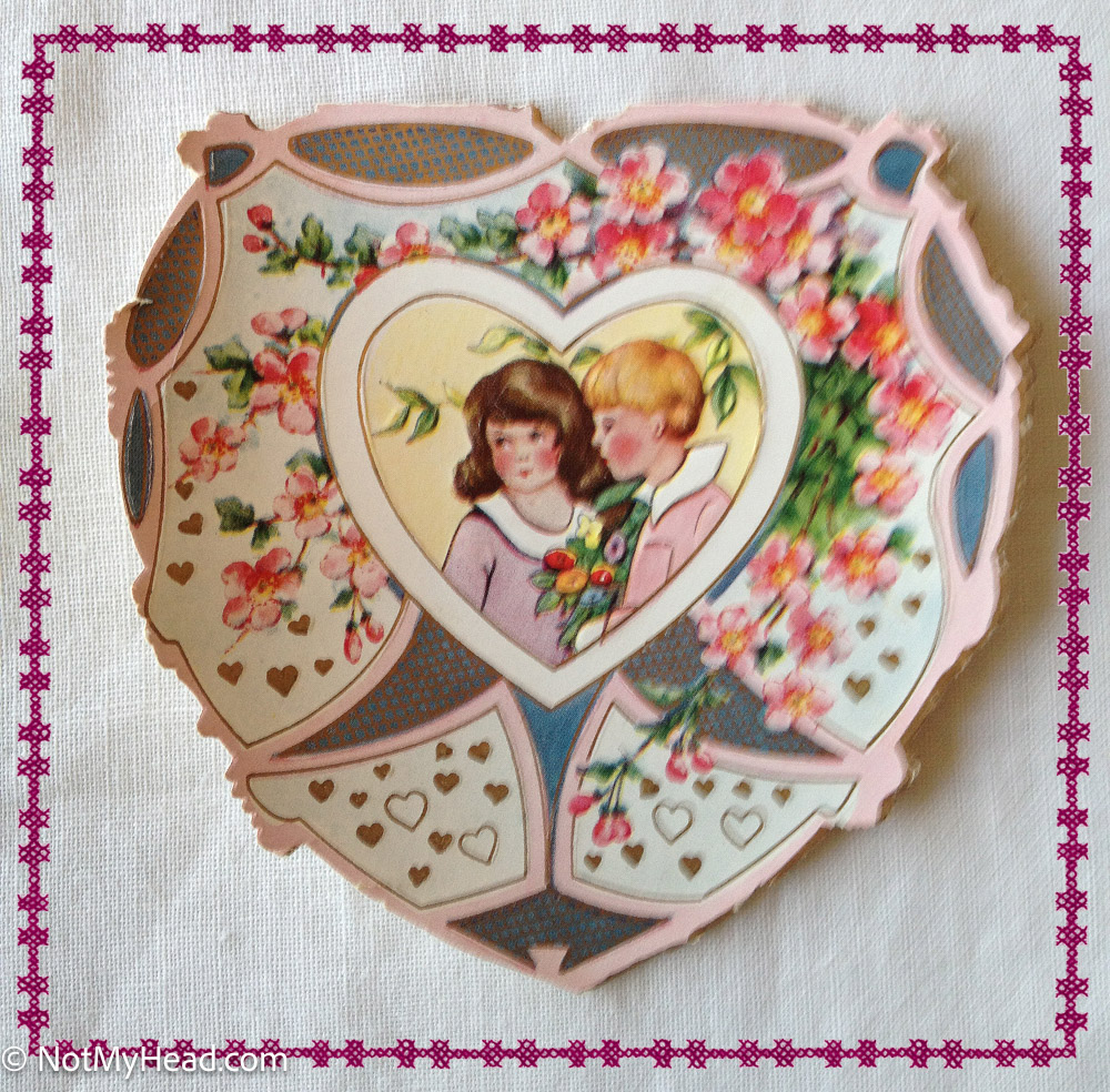 Photo of: Gram's Vintage Valentines: 1910-1930: Stored in a MacFarlane's heart shaped candy box.  Date: 2013-02-11T11:45:17-08:00 Location:    USA