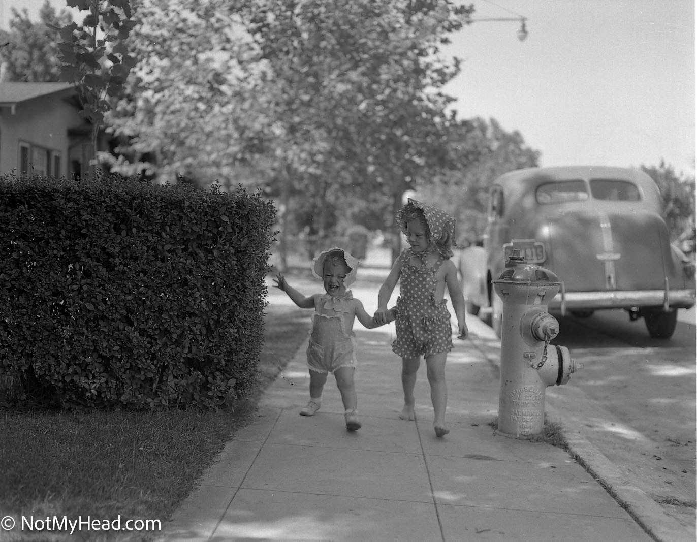 Photo of: Nancy and Mary Kim Date: 1941Location:    USA