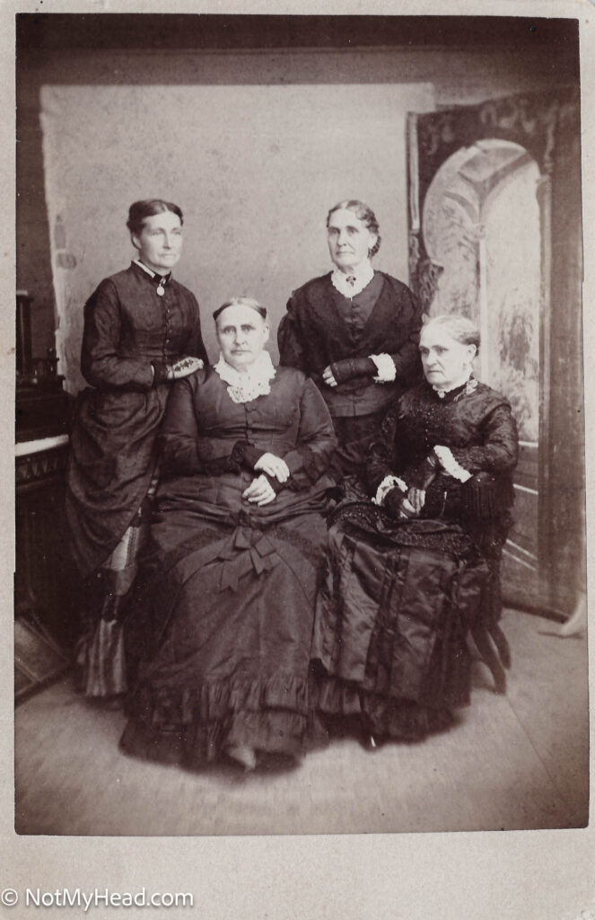 Photo of: The Bebee Sisters: [standing] Orpha Matilda, Laura Antoinette [sitting] Ann Eliza, Eleanor S. late 1870s  Date: 1875 Location:    USA